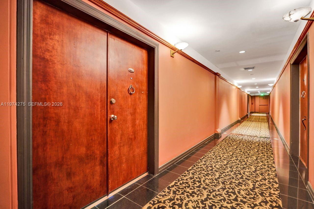 100 Lincoln Road, Unit PH12 Miami Beach, FL 33139 - Photo 49 of 59 a view of hallway with a large window