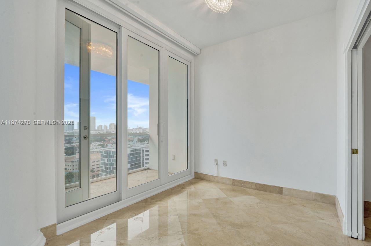 100 Lincoln Road, Unit PH12 Miami Beach, FL 33139 - Photo 8 of 59 a view of an empty room and window