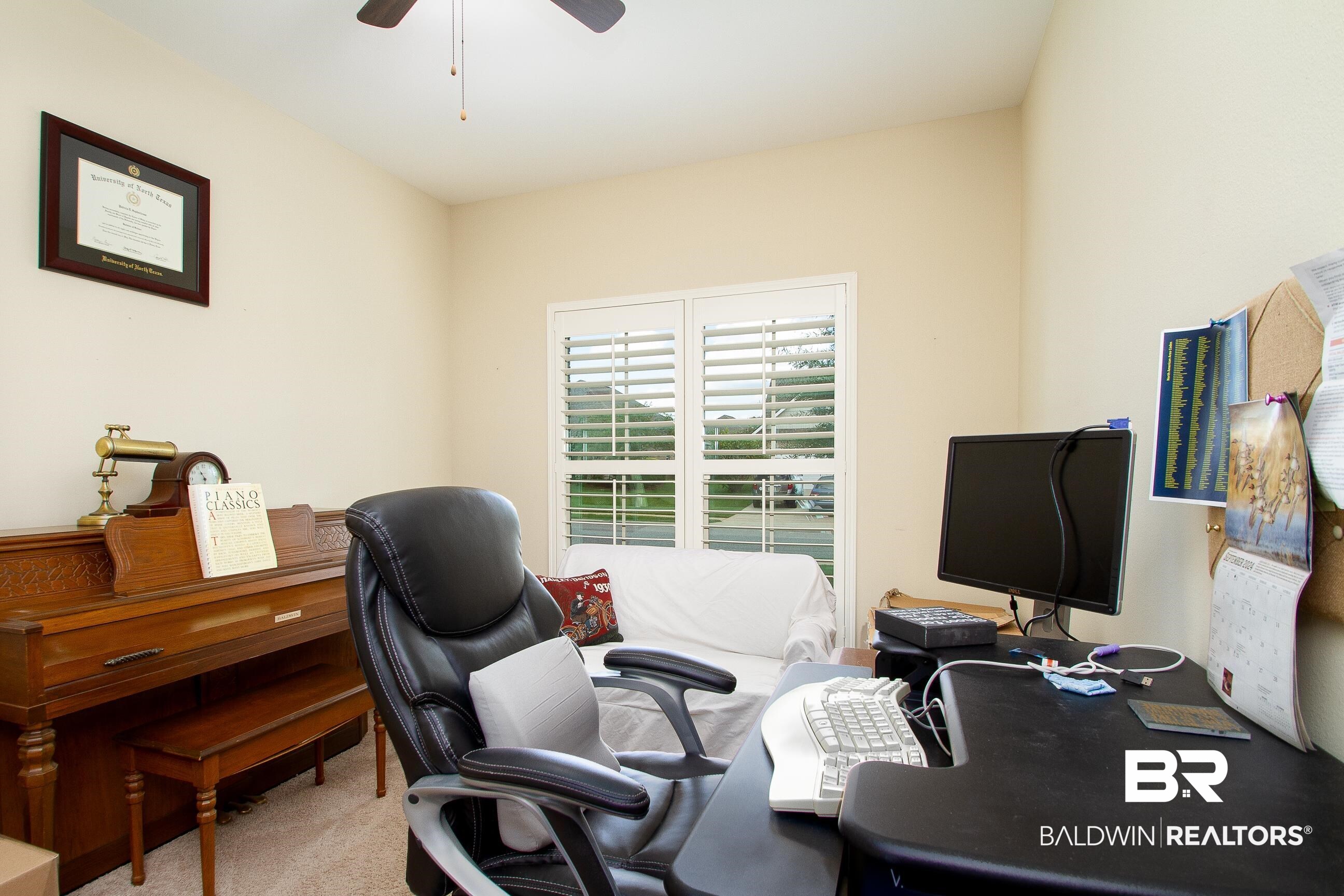 8625 Rosedown Lane Daphne, AL 36526 - Photo 20 of 29 Home office with ceiling fan and carpet floors