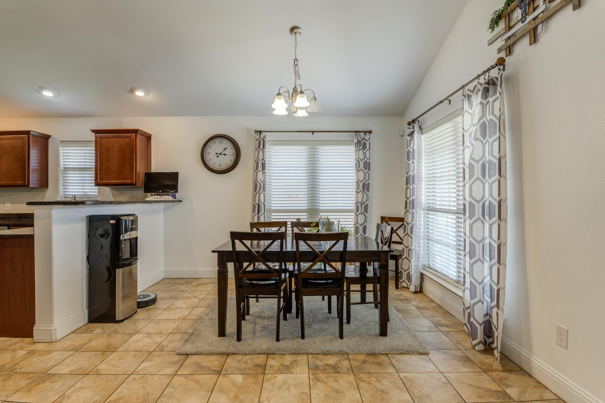 5747 110th Street Lubbock, TX 79424 - Photo 16 of 42 a view of a a dining room with furniture window and outside view
