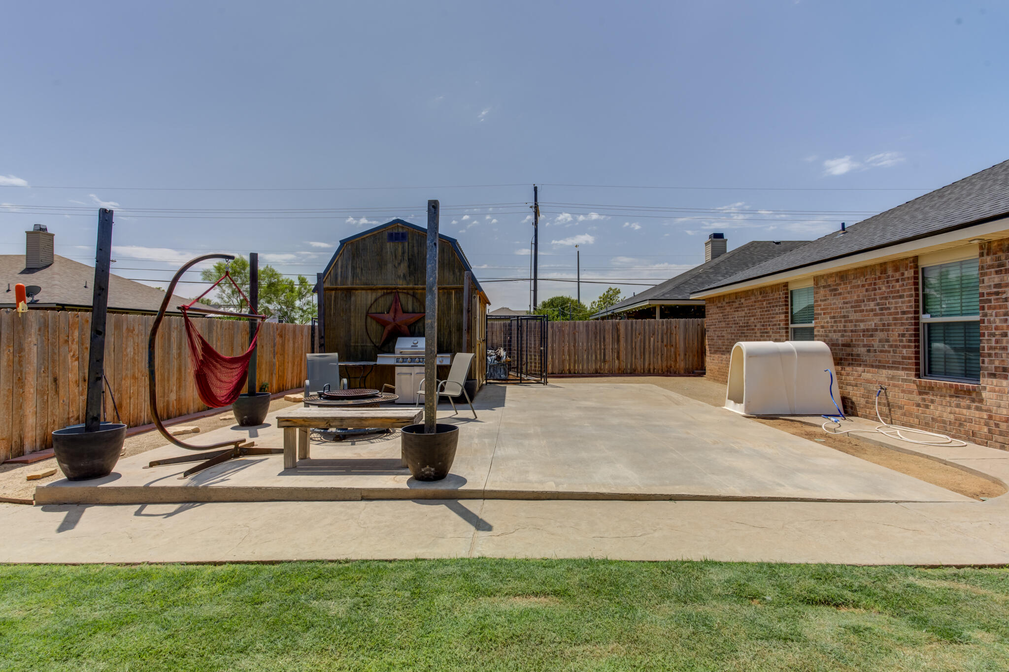 5747 110th Street Lubbock, TX 79424 - Photo 40 of 42 a front view of a house with garden