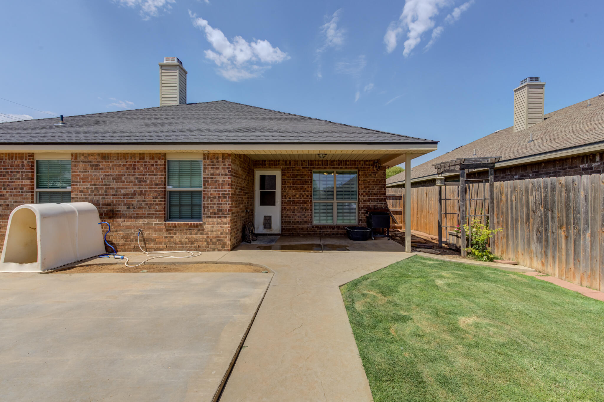 5747 110th Street Lubbock, TX 79424 - Photo 42 of 42 a front view of a house with a yard