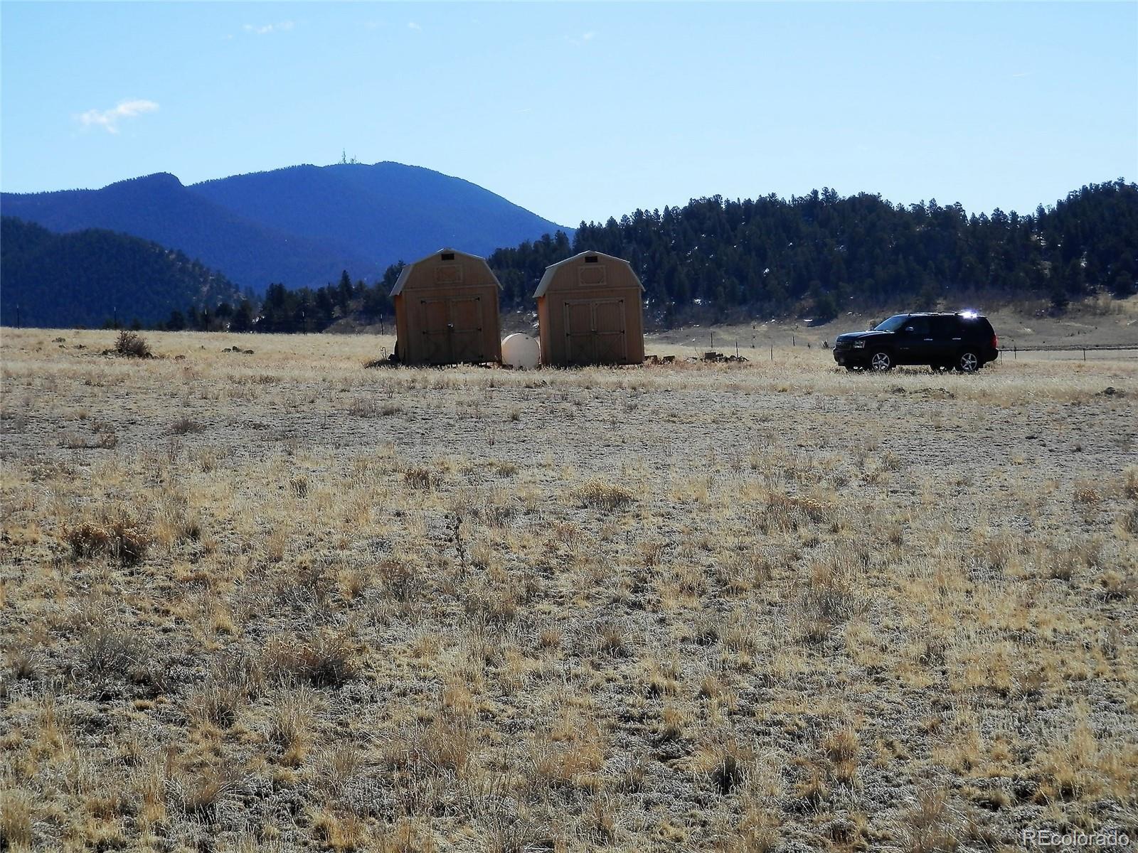 6763 Jefferson Road Hartsel, CO 80449 - Photo 29 of 32 a view of mountain and a yard