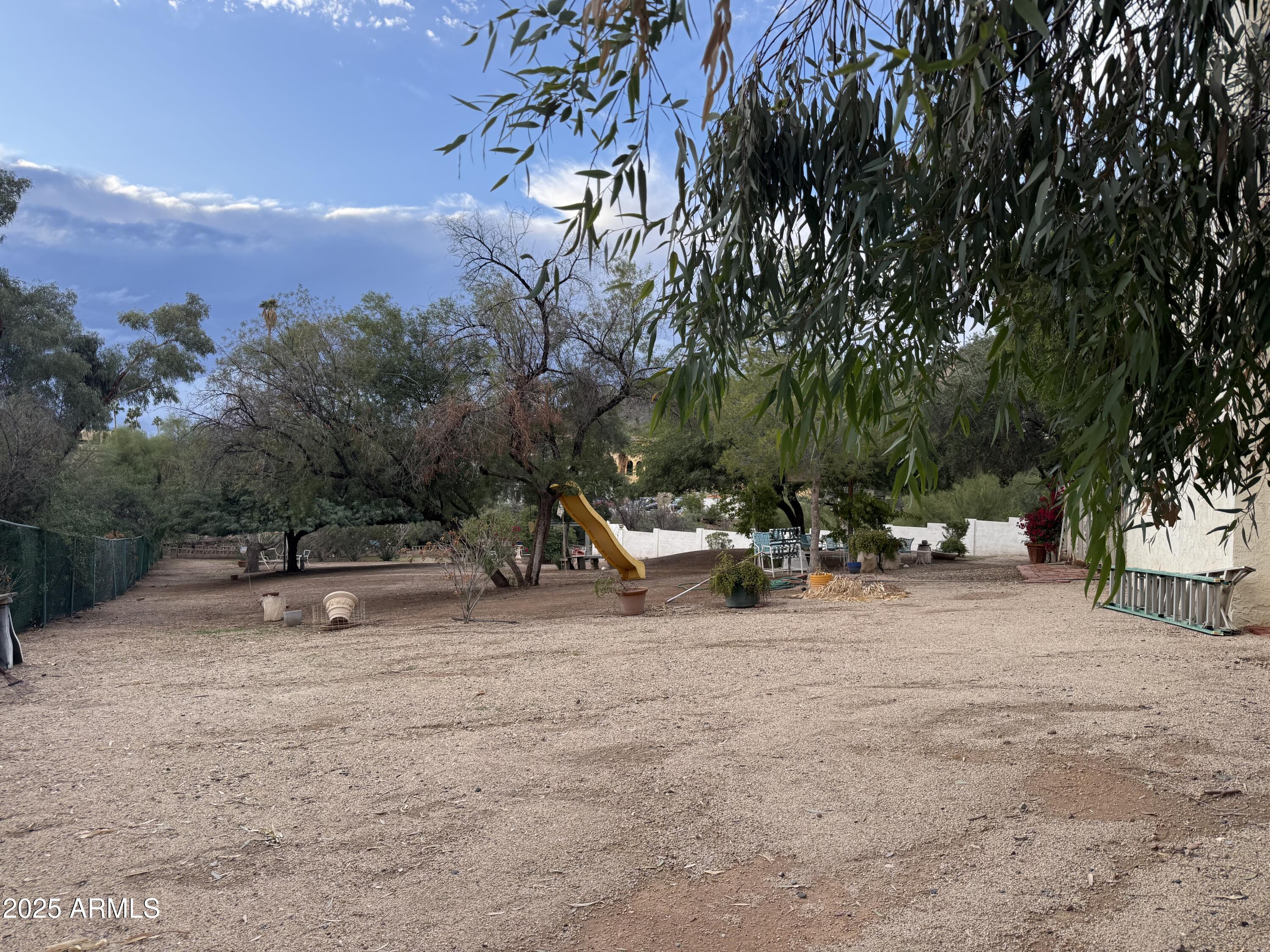 6618 North Hillside Drive Paradise Valley, AZ 85253 - Photo 8 of 10 a view of a park with swings and slides