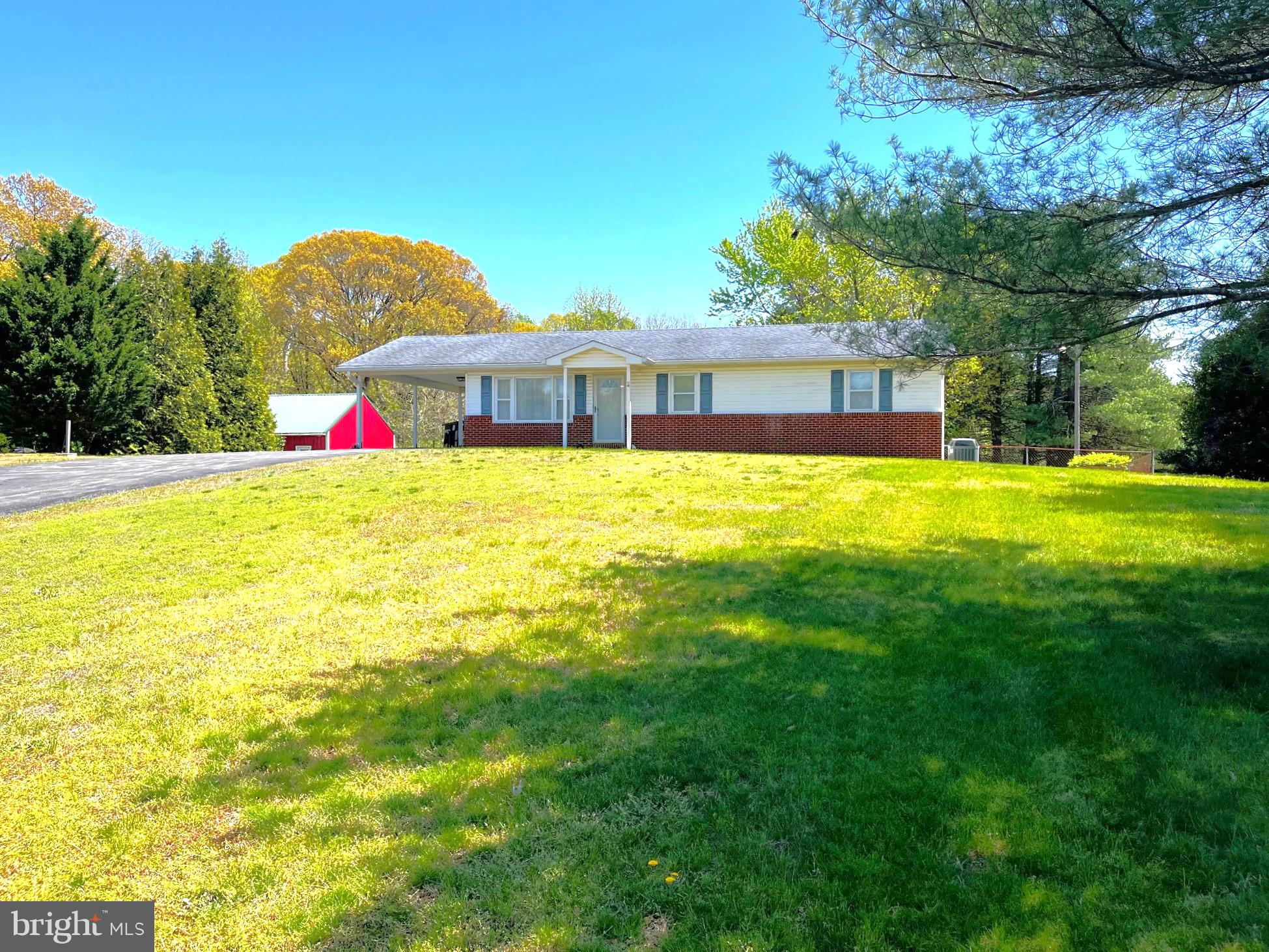 3820 Hallowing Point Road Prince Frederick, MD 20678 - Photo 23 of 23 a view of a house with a yard and basketball court