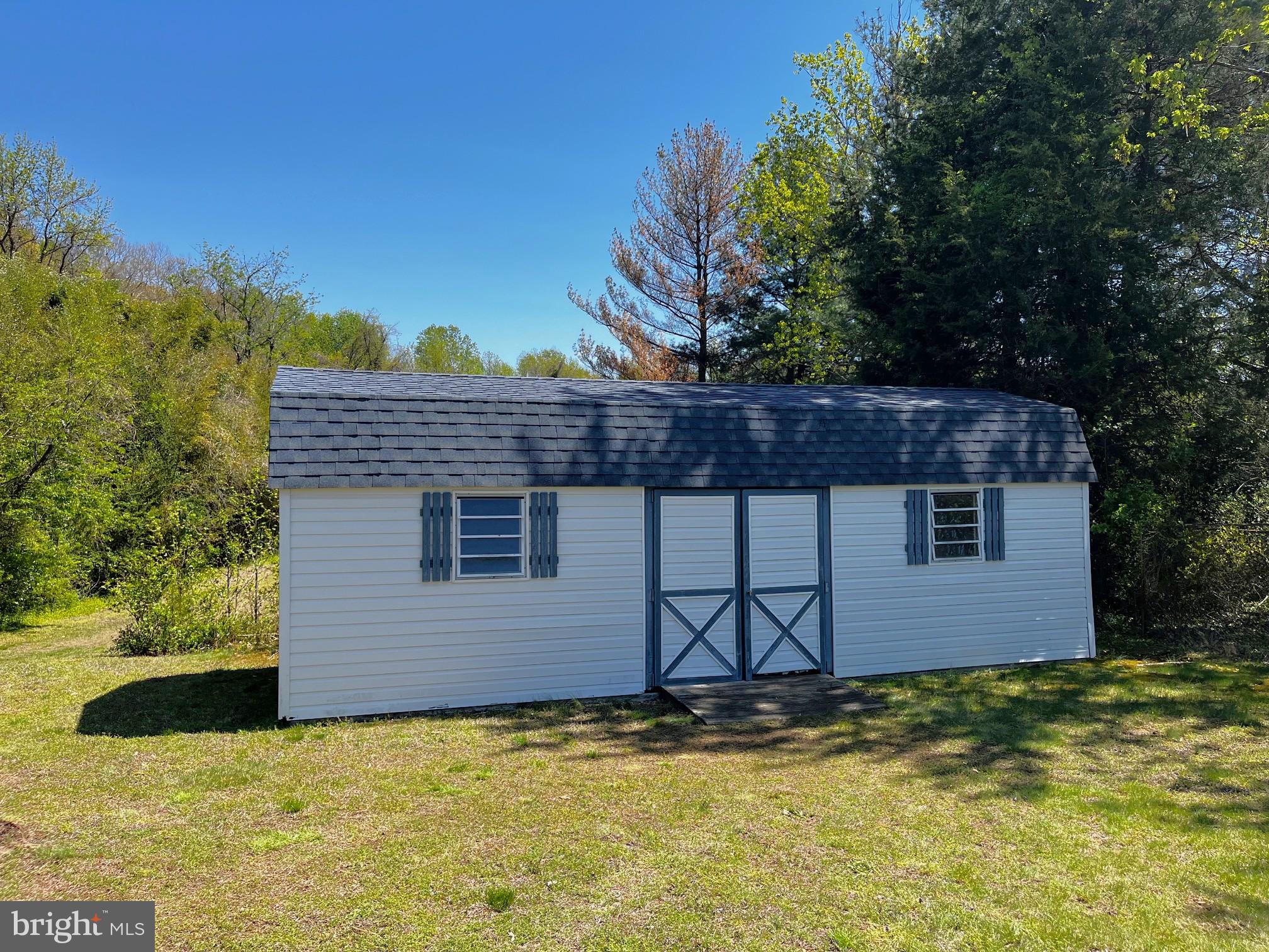 3820 Hallowing Point Road Prince Frederick, MD 20678 - Photo 3 of 23 a view of a house with a yard
