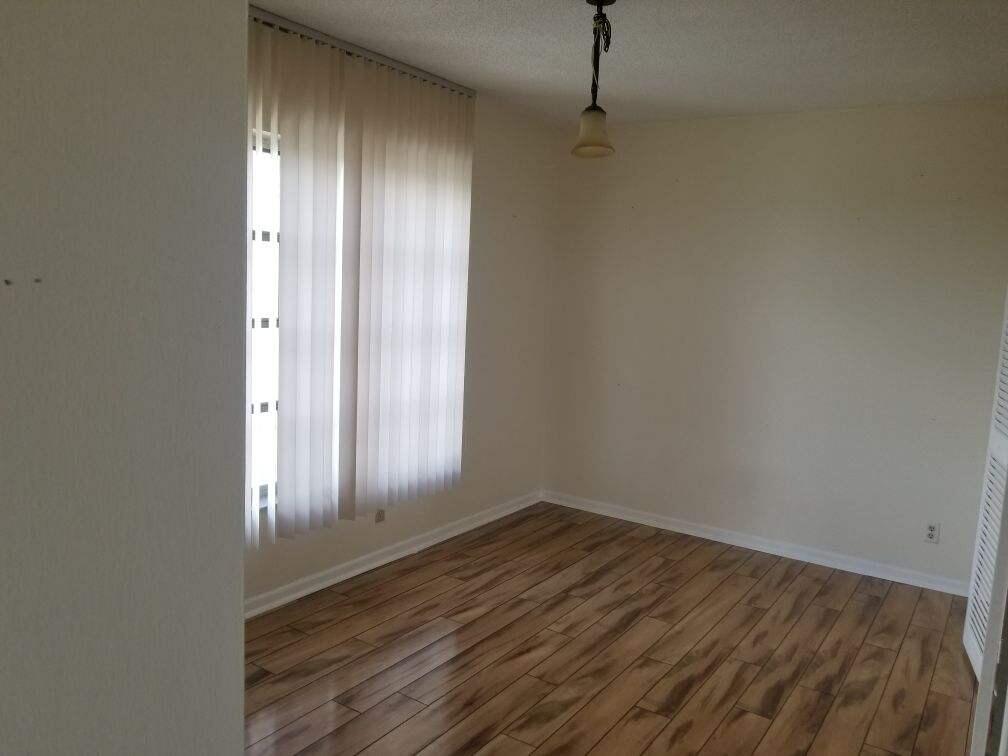 10777 West Sample Road, Unit 812 Coral Springs, FL 33065 - Photo 14 of 25 DiningRoomCS1