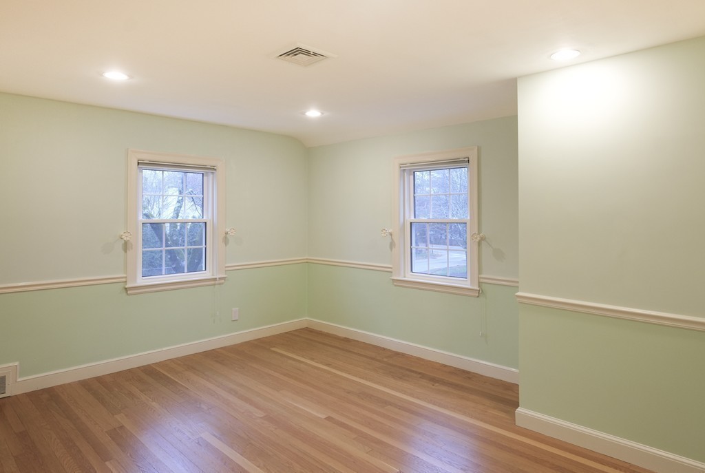 295 Concord Road Wayland, MA 01778 - Photo 20 of 30 a view of empty room with wooden floor and fan