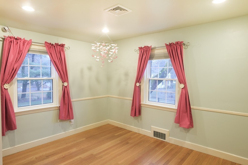 295 Concord Road Wayland, MA 01778 - Photo 21 of 30 a view of a room with wooden floor and windows