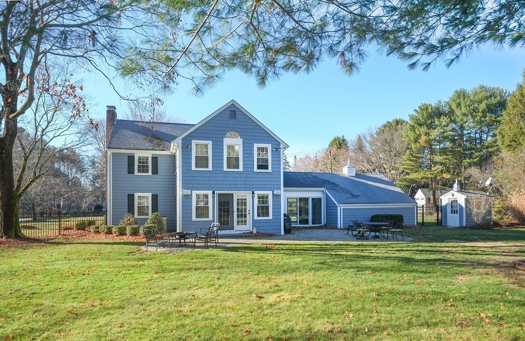 295 Concord Road Wayland, MA 01778 - Photo 25 of 30 a front view of a house with a garden