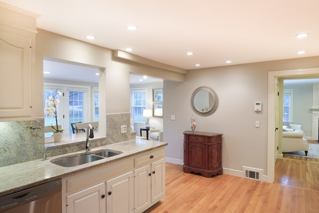295 Concord Road Wayland, MA 01778 - Photo 6 of 30 a spacious bathroom with a double vanity sink and a mirror