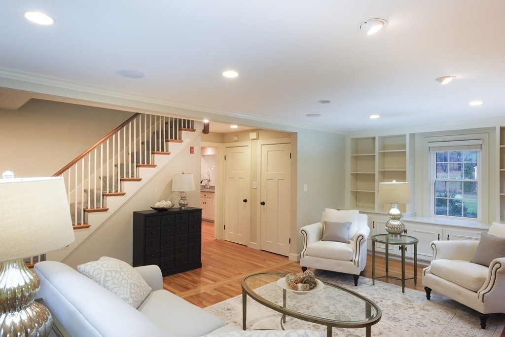 295 Concord Road Wayland, MA 01778 - Photo 8 of 30 a living room with furniture and stairs