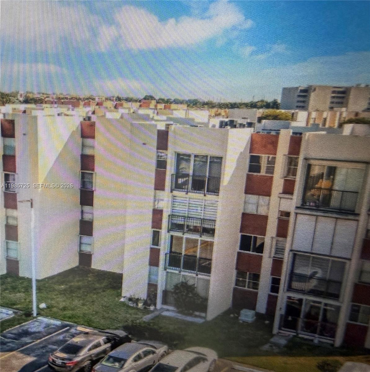 9441 Southwest 4th Street, Unit 111 Miami, FL 33174 - Photo 3 of 6 a view of a building with a sink