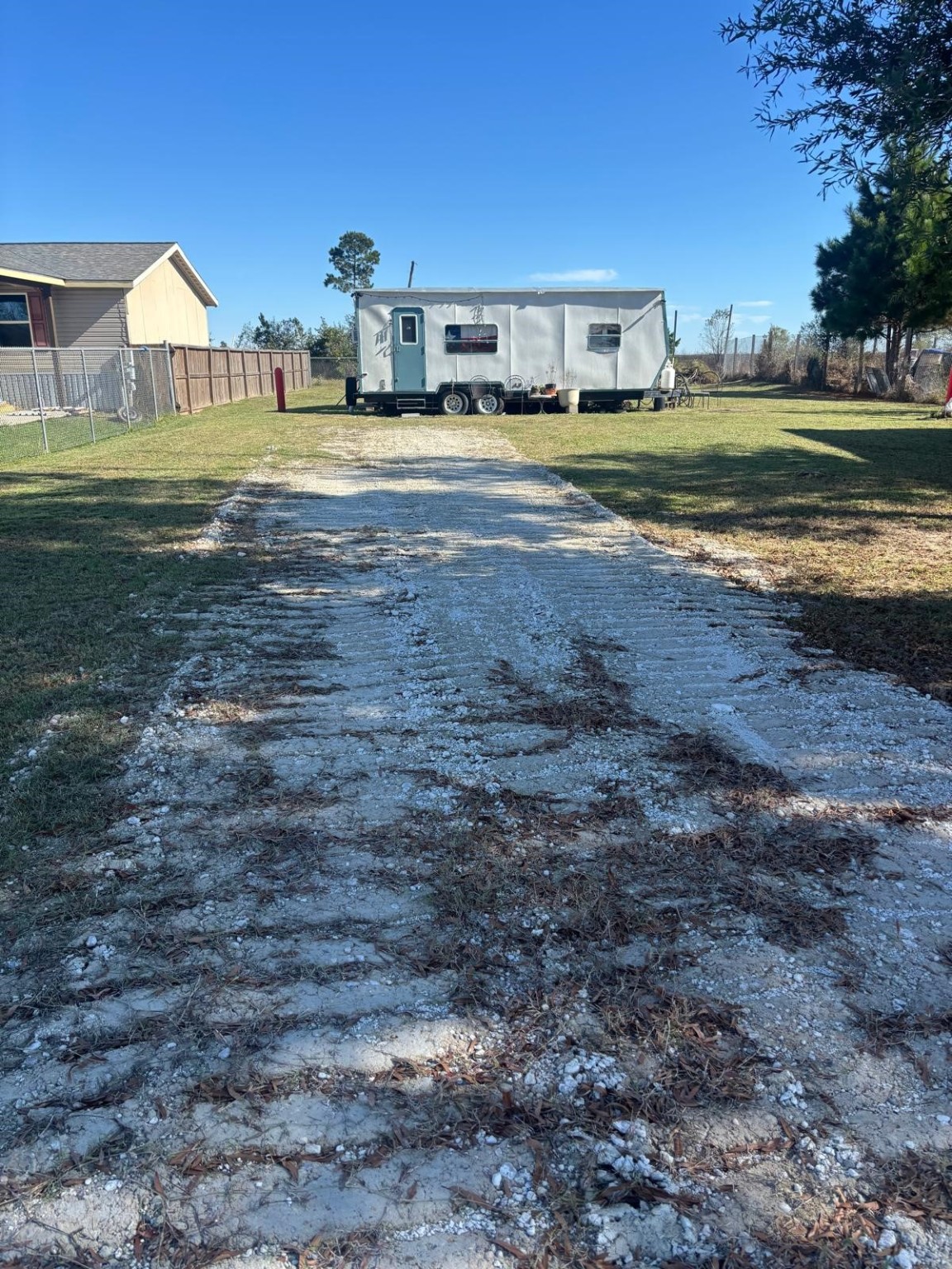 1032 Rd 3570 Cleveland Tx 77327 Cleveland, TX 77327 - Photo 3 of 8 a view of a house with a yard