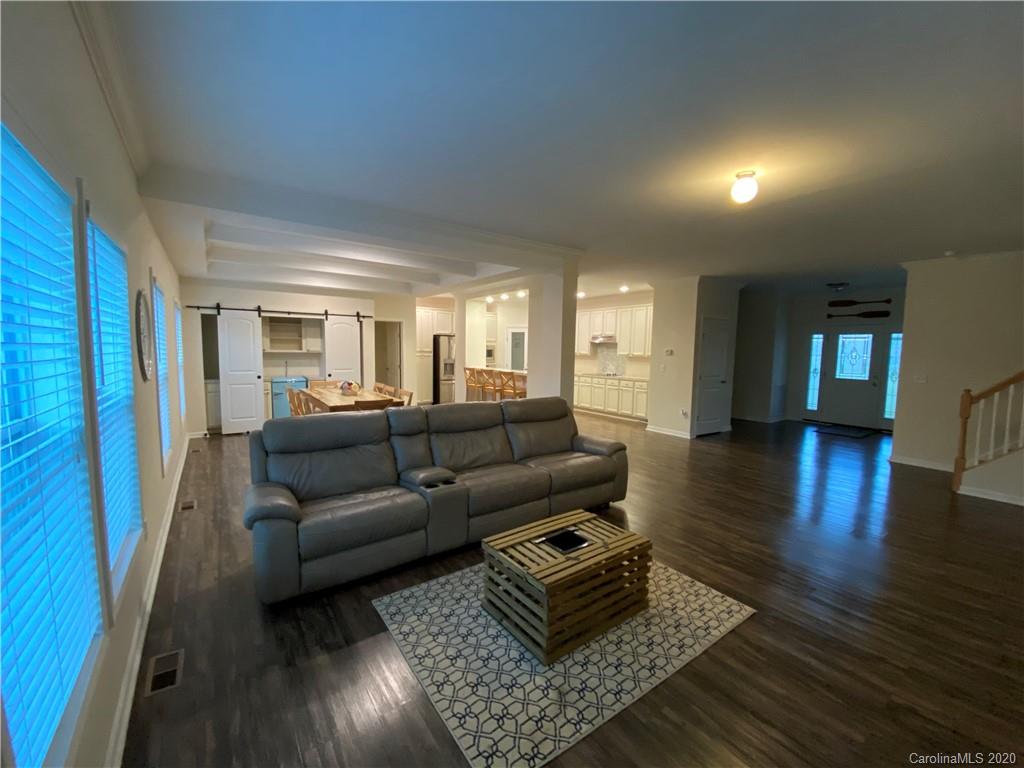4009 Love Mill Road Monroe, NC 28110 - Photo 14 of 25 a living room with furniture and a wooden floor