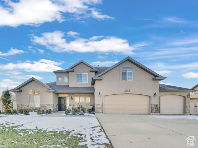 2043 West Hollybrook Way Farmington, UT 84025 - Photo 1 of 1 View of front of house featuring a garage