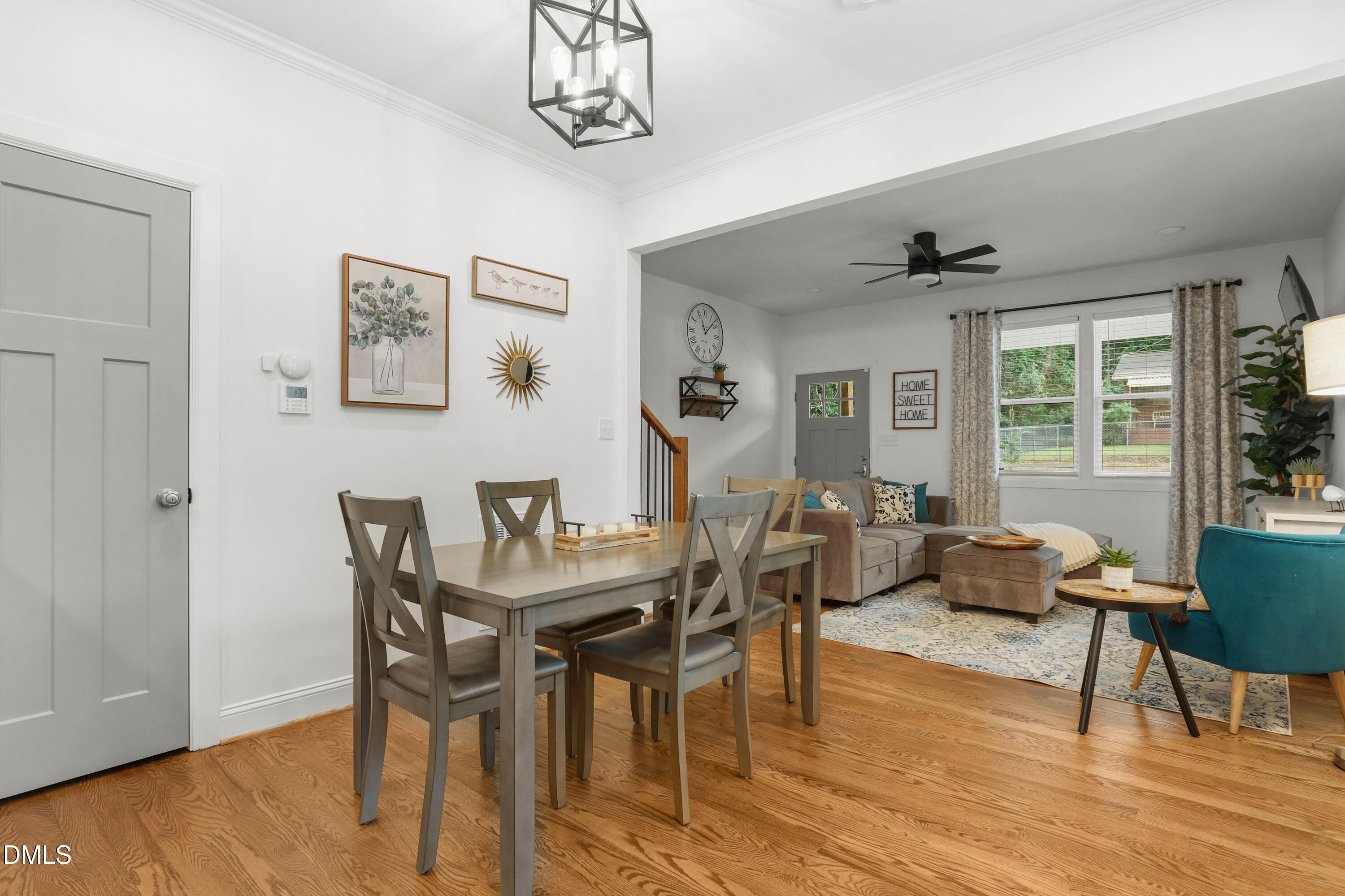 1217 Rosedale Avenue, Unit B Durham, NC 27707 - Photo 6 of 24 a view of a dining room with furniture window and wooden floor