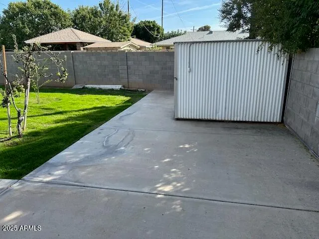 a view of a backyard with a garden