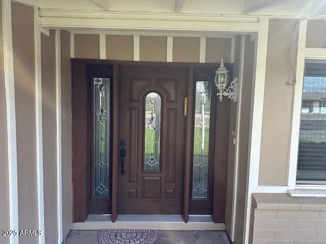 a view of a brick house with a door