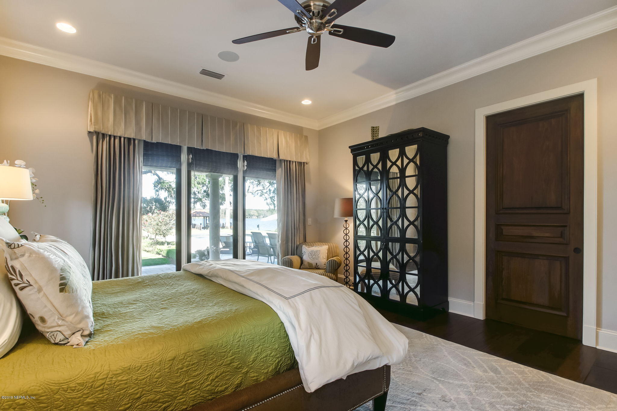 1895 Bishop Estates Road Jacksonville, FL 32259 - Photo 23 of 102 a bedroom with a large bed and a window