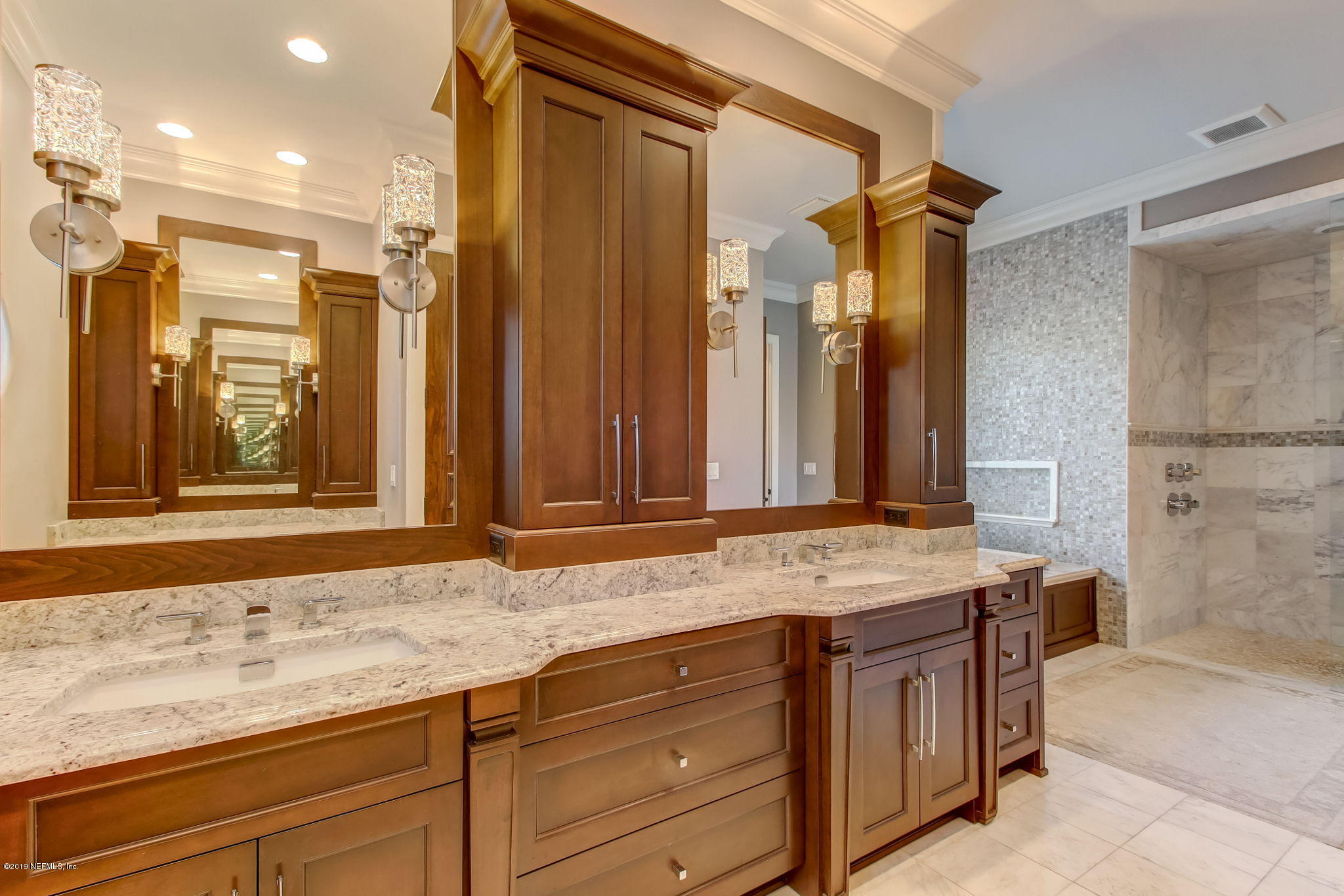 1895 Bishop Estates Road Jacksonville, FL 32259 - Photo 26 of 102 a bathroom with a granite countertop sink and a mirror