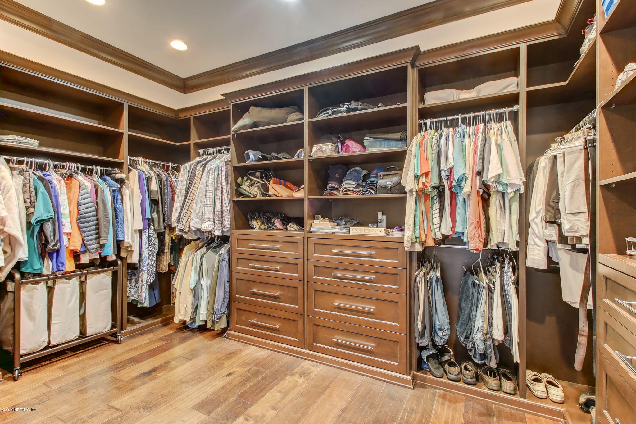 1895 Bishop Estates Road Jacksonville, FL 32259 - Photo 30 of 102 a view of walk in closet with clothes and shoes