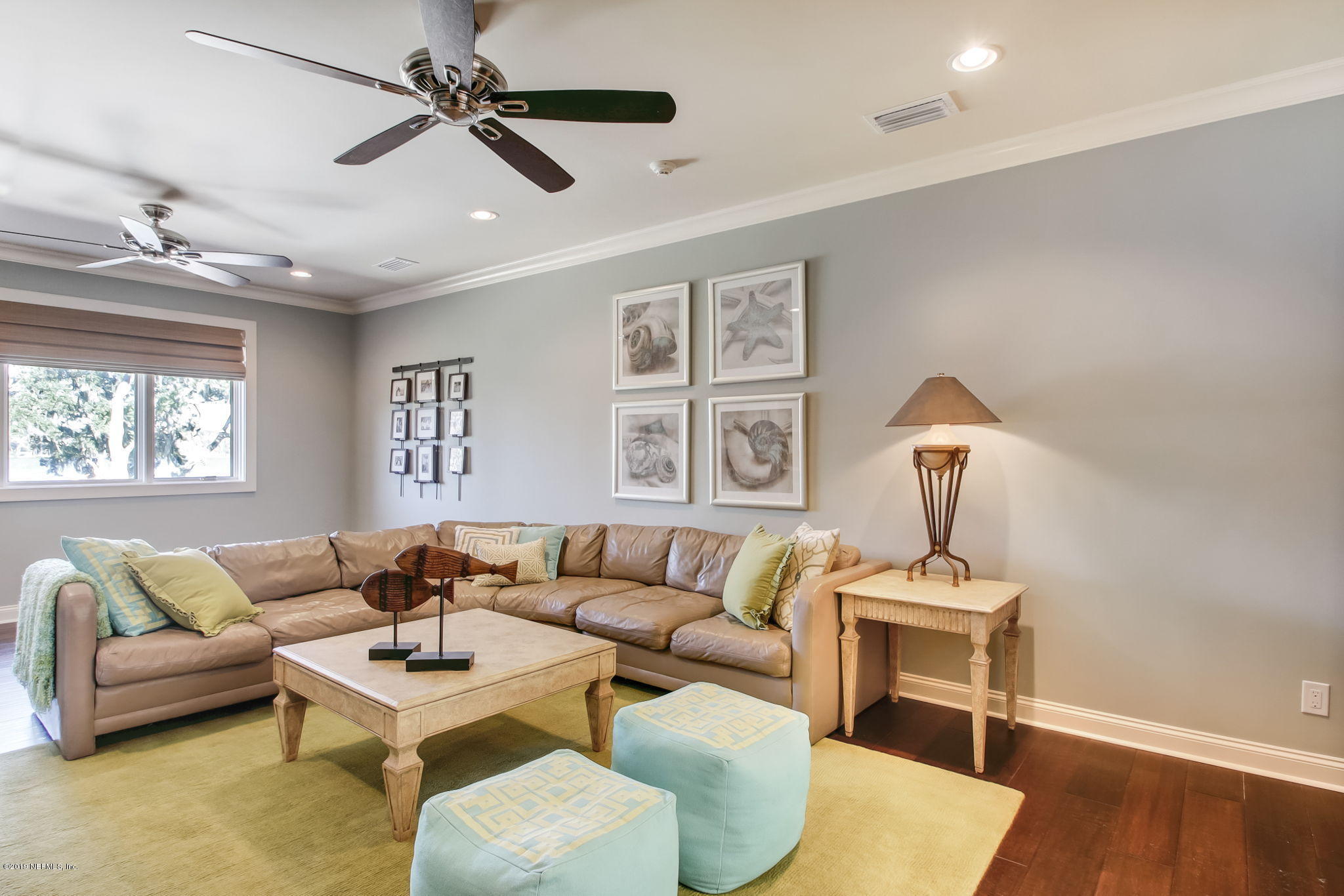 1895 Bishop Estates Road Jacksonville, FL 32259 - Photo 36 of 102 a living room with furniture and a wooden floor