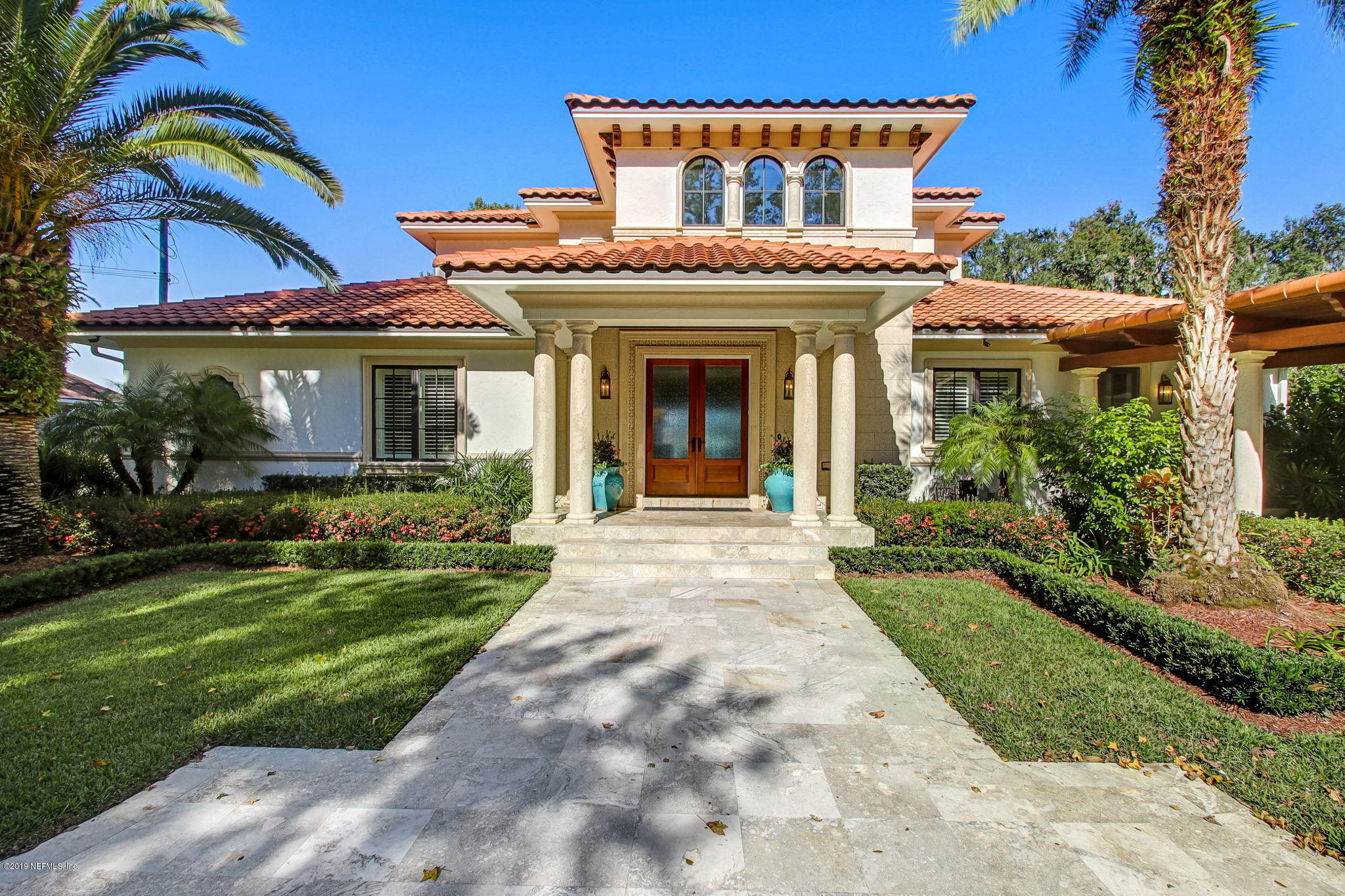 1895 Bishop Estates Road Jacksonville, FL 32259 - Photo 4 of 102 a view of a white house with a big yard and potted plants