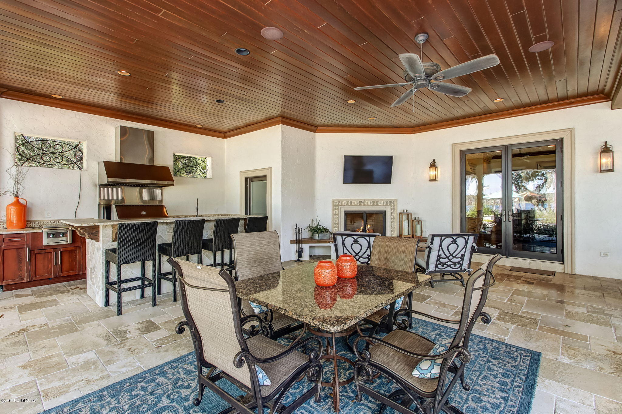1895 Bishop Estates Road Jacksonville, FL 32259 - Photo 47 of 102 a dining room with furniture a fireplace and wooden floor