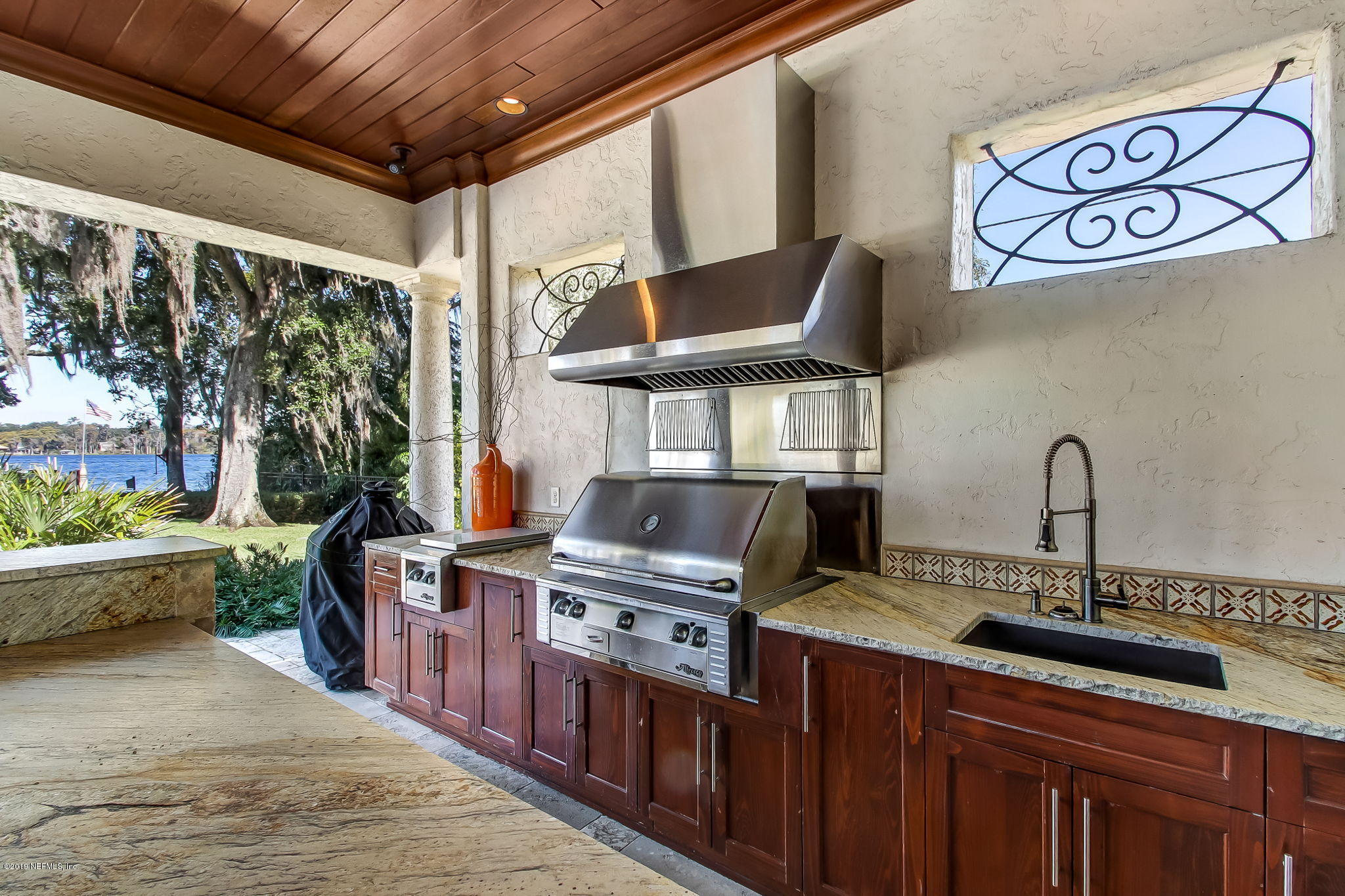 1895 Bishop Estates Road Jacksonville, FL 32259 - Photo 50 of 102 a kitchen with stainless steel appliances granite countertop a stove and a sink