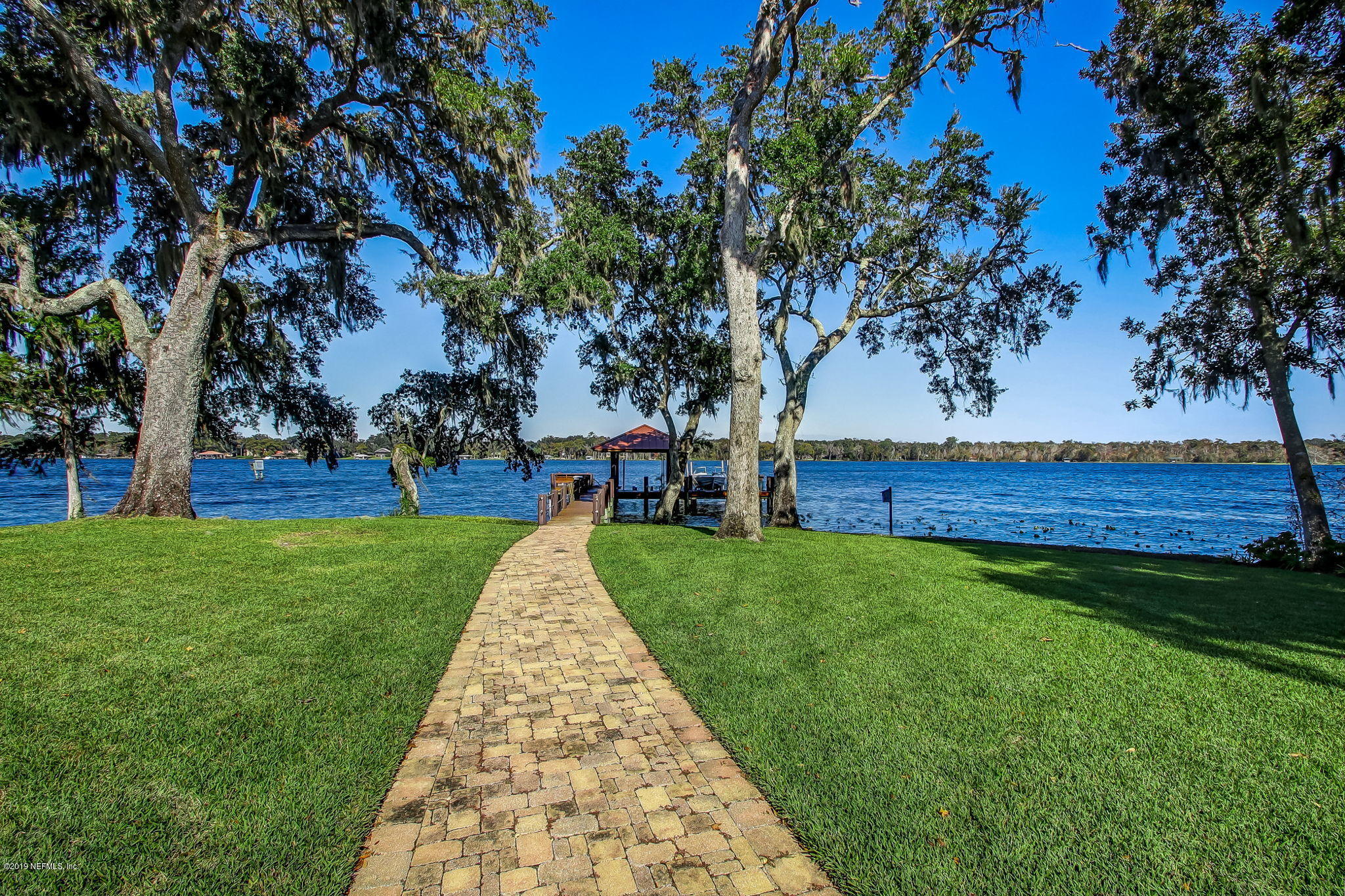 1895 Bishop Estates Road Jacksonville, FL 32259 - Photo 65 of 102 a view of a yard with plants and trees