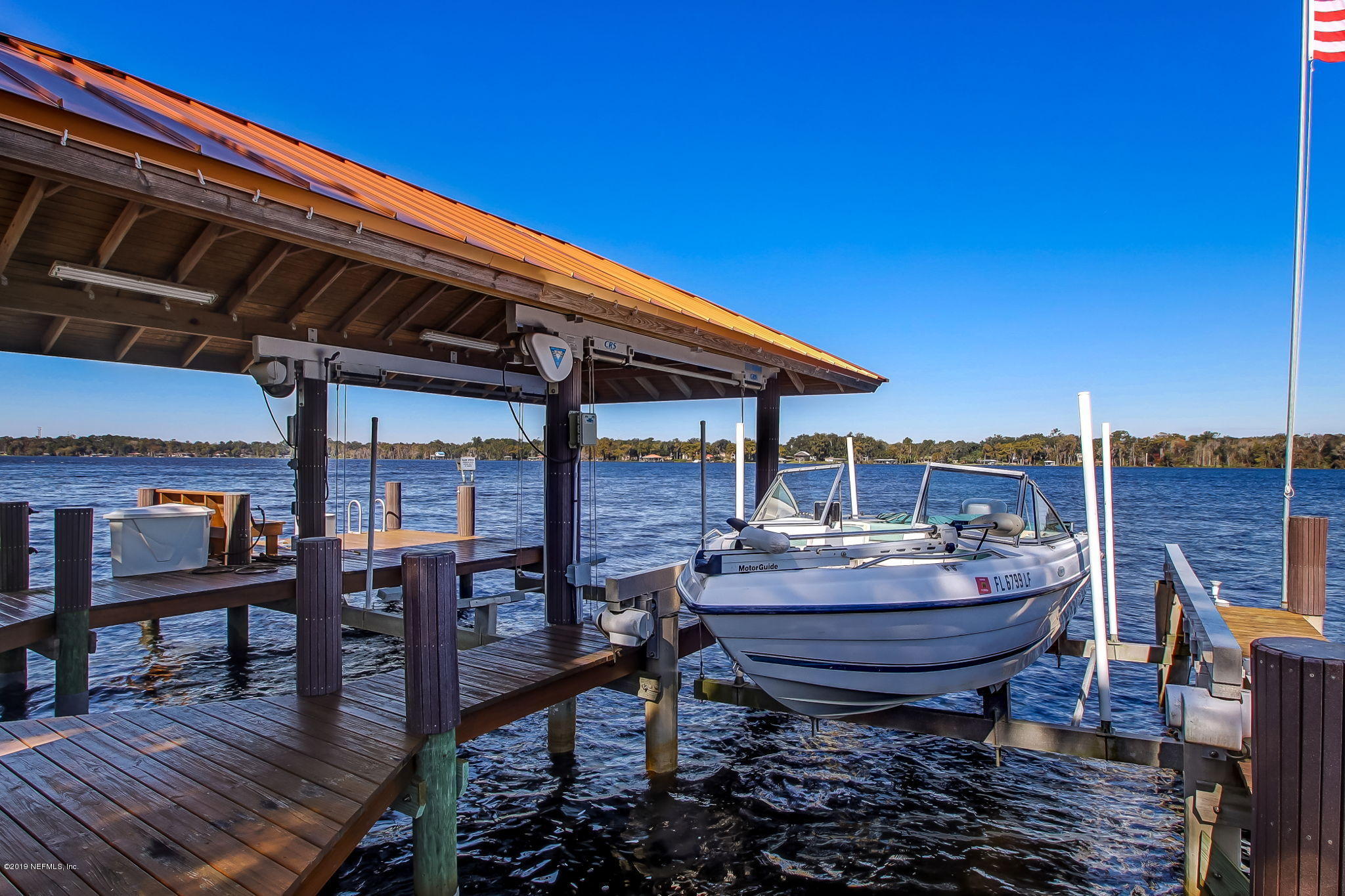 1895 Bishop Estates Road Jacksonville, FL 32259 - Photo 69 of 102 a backyard of a house with barbeque oven table and chairs