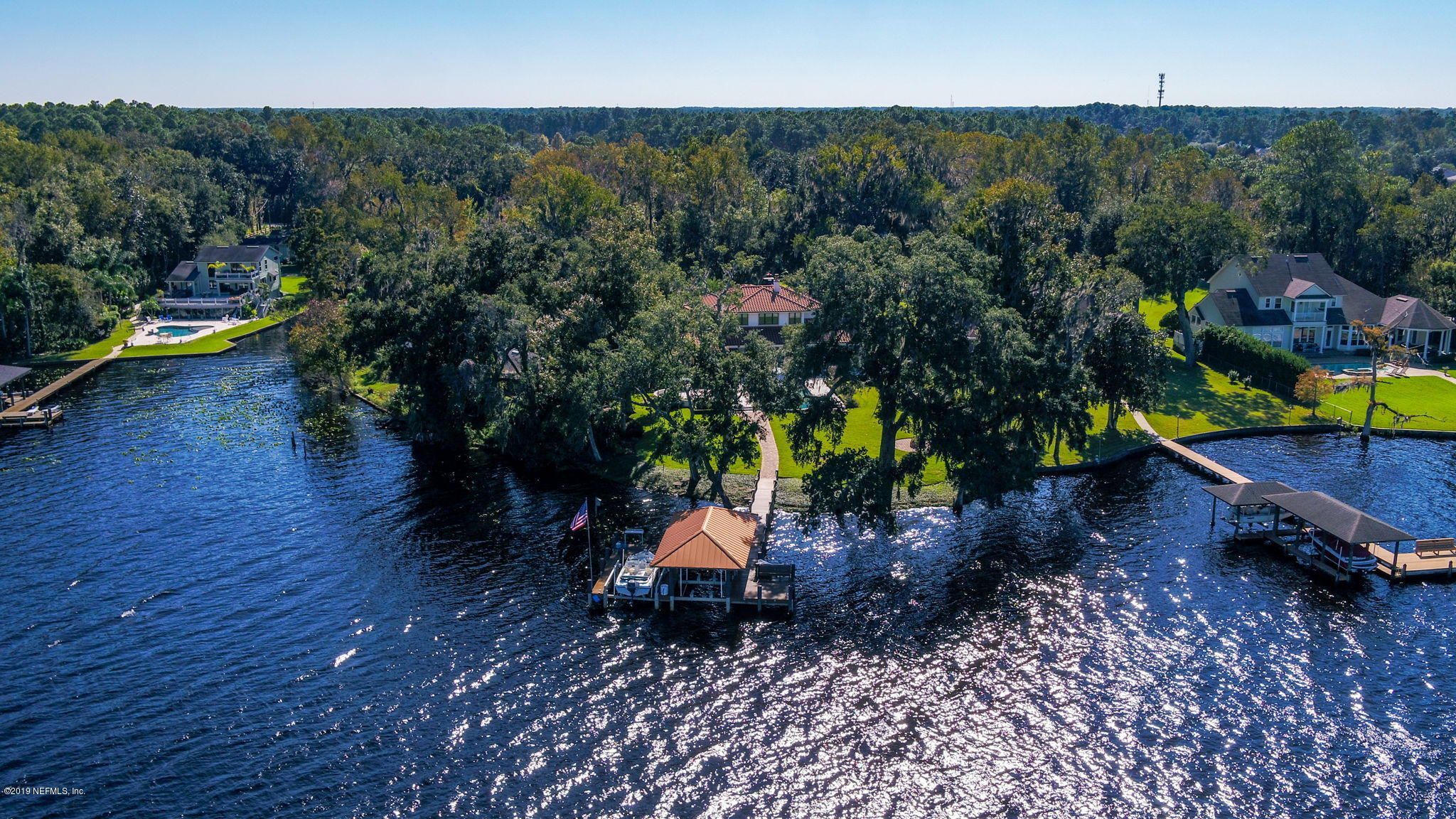 1895 Bishop Estates Road Jacksonville, FL 32259 - Photo 77 of 102 a backyard of a house with a yard and outdoor seating