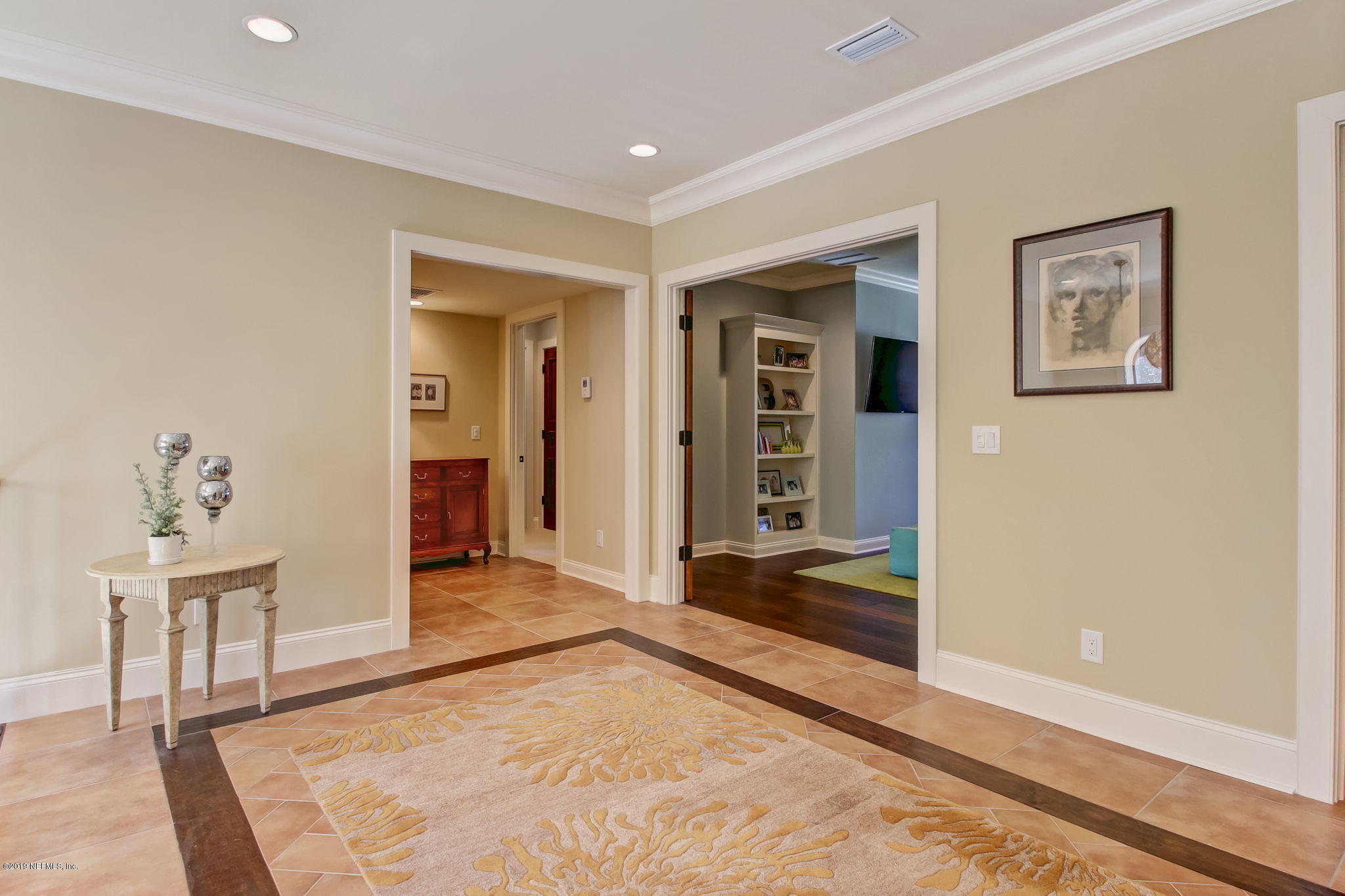 1895 Bishop Estates Road Jacksonville, FL 32259 - Photo 99 of 102 a view of a hallway with wooden floor and a living room