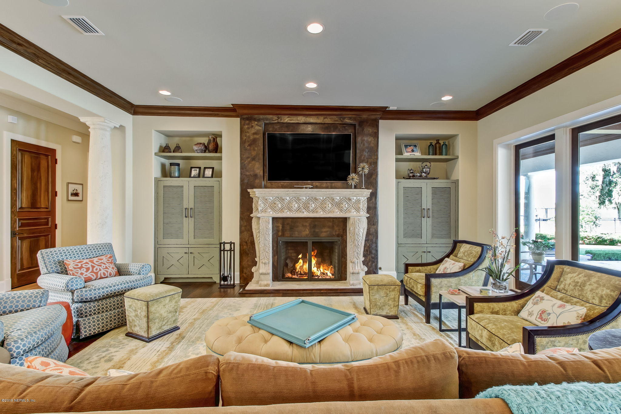 1895 Bishop Estates Road Jacksonville, FL 32259 - Photo 10 of 102 a living room with furniture and a fireplace