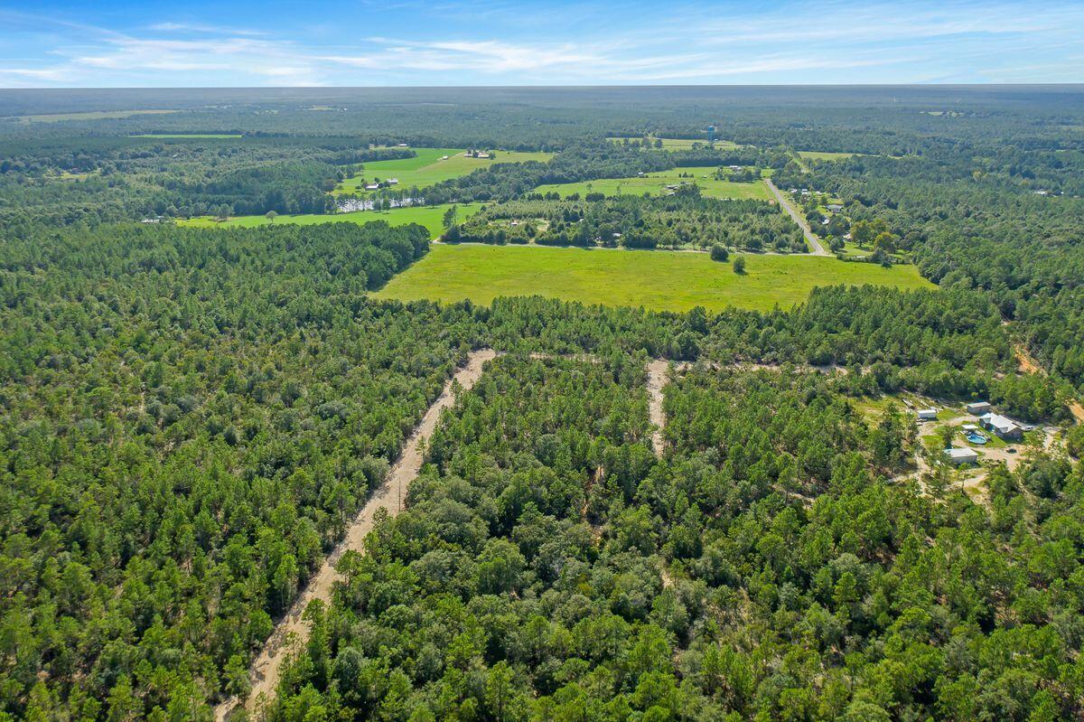 6 Sexton Road DeFuniak Springs, FL 32433 - Photo 1 of 10 a view of a field with an ocean