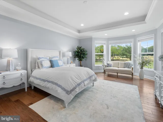 a bathroom with a sink vanity and a mirror