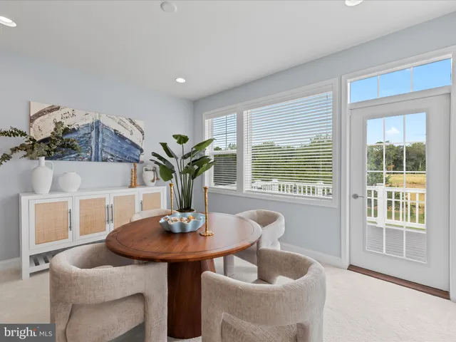 an aerial view of residential houses with outdoor space and swimming pool