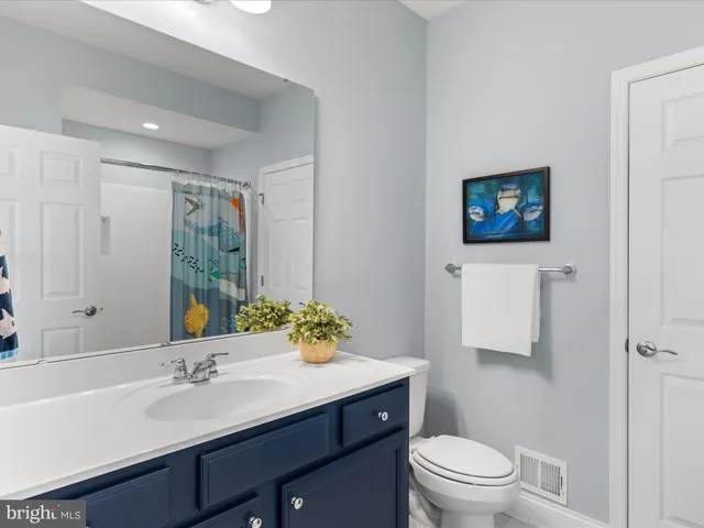 a view of a street with sitting area