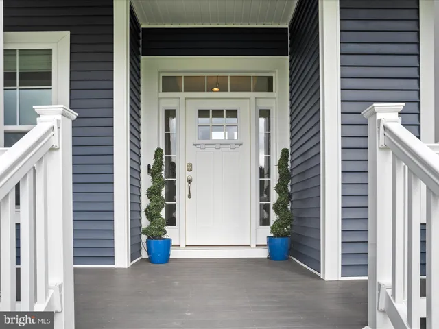 a kitchen with stainless steel appliances a refrigerator and cabinets