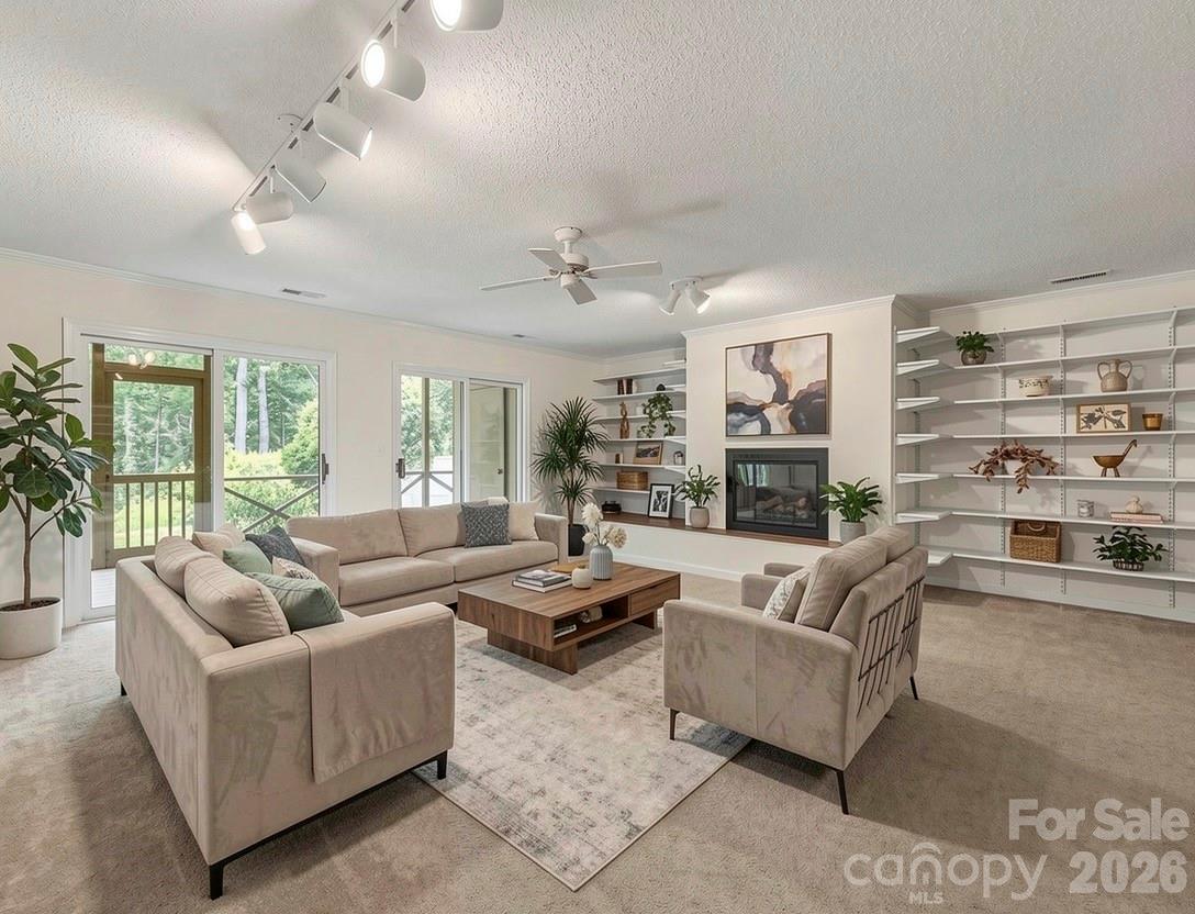 12 Hunting Country Trail Tryon, NC 28782 - Photo 26 of 42 a living room with furniture and a large window