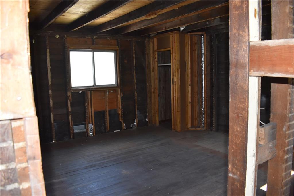 2380 Mt Pleasant Road Ruffs Dale, PA 15679 - Photo 17 of 18 an empty room with wooden floor and windows