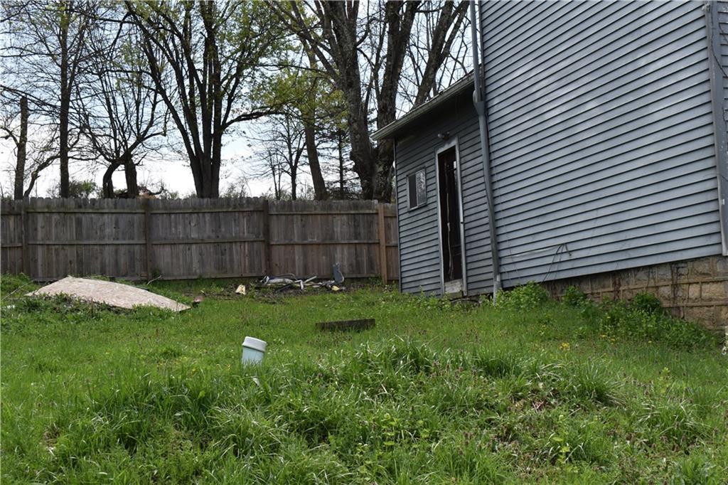 2380 Mt Pleasant Road Ruffs Dale, PA 15679 - Photo 2 of 18 a view of a backyard with a large tree