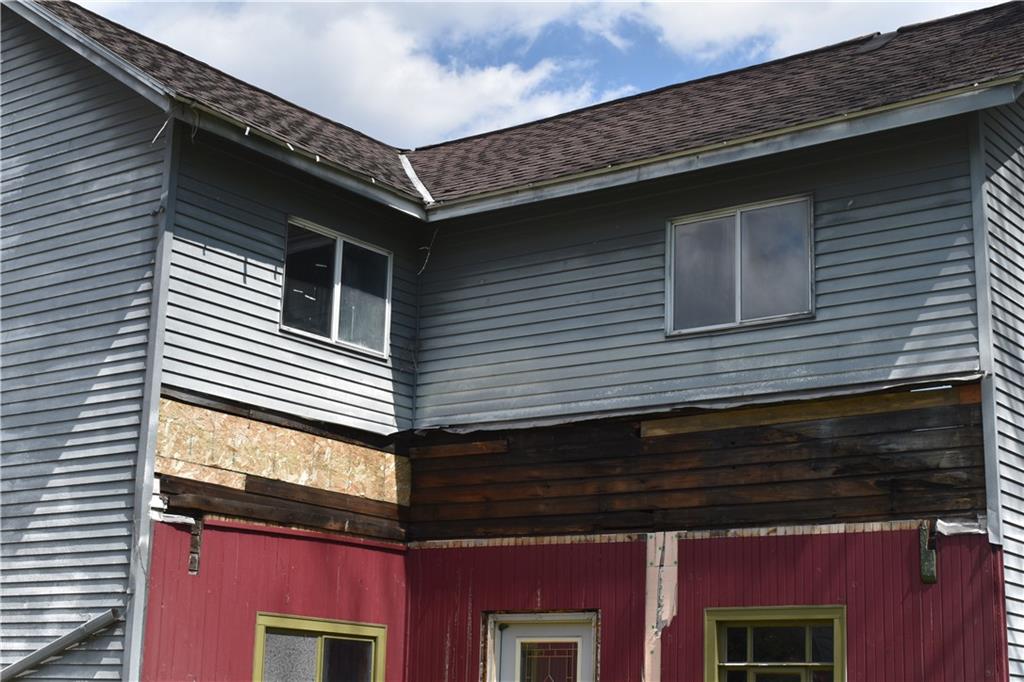 2380 Mt Pleasant Road Ruffs Dale, PA 15679 - Photo 6 of 18 a view of a house with a door and deck