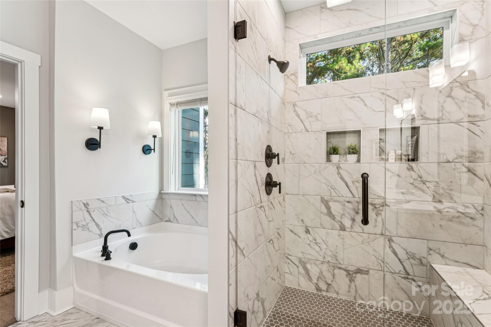7822 Russell Road Indian Trail, NC 28079 - Photo 35 of 48 a bathroom with a bathtub and shower