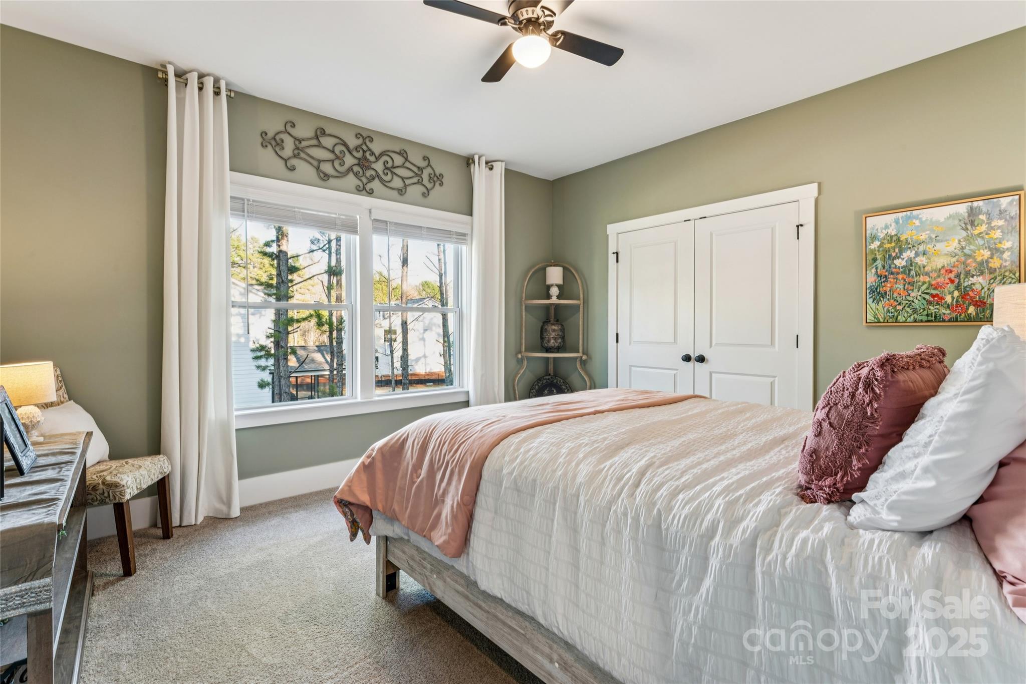 7822 Russell Road Indian Trail, NC 28079 - Photo 38 of 48 a bedroom with a bed and a window