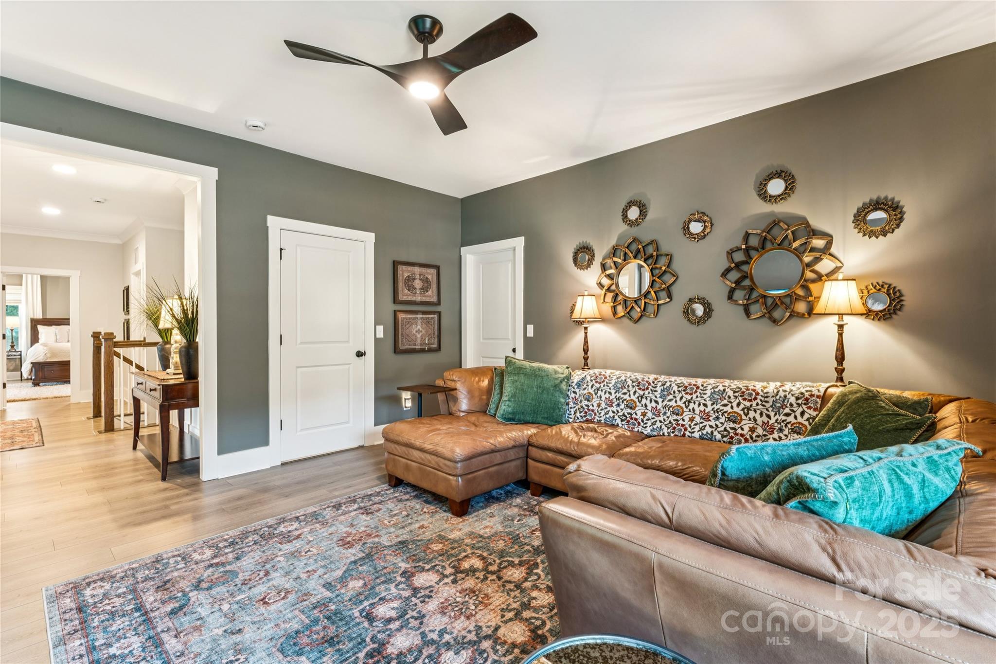 7822 Russell Road Indian Trail, NC 28079 - Photo 40 of 48 a living room with furniture and a view of bathroom