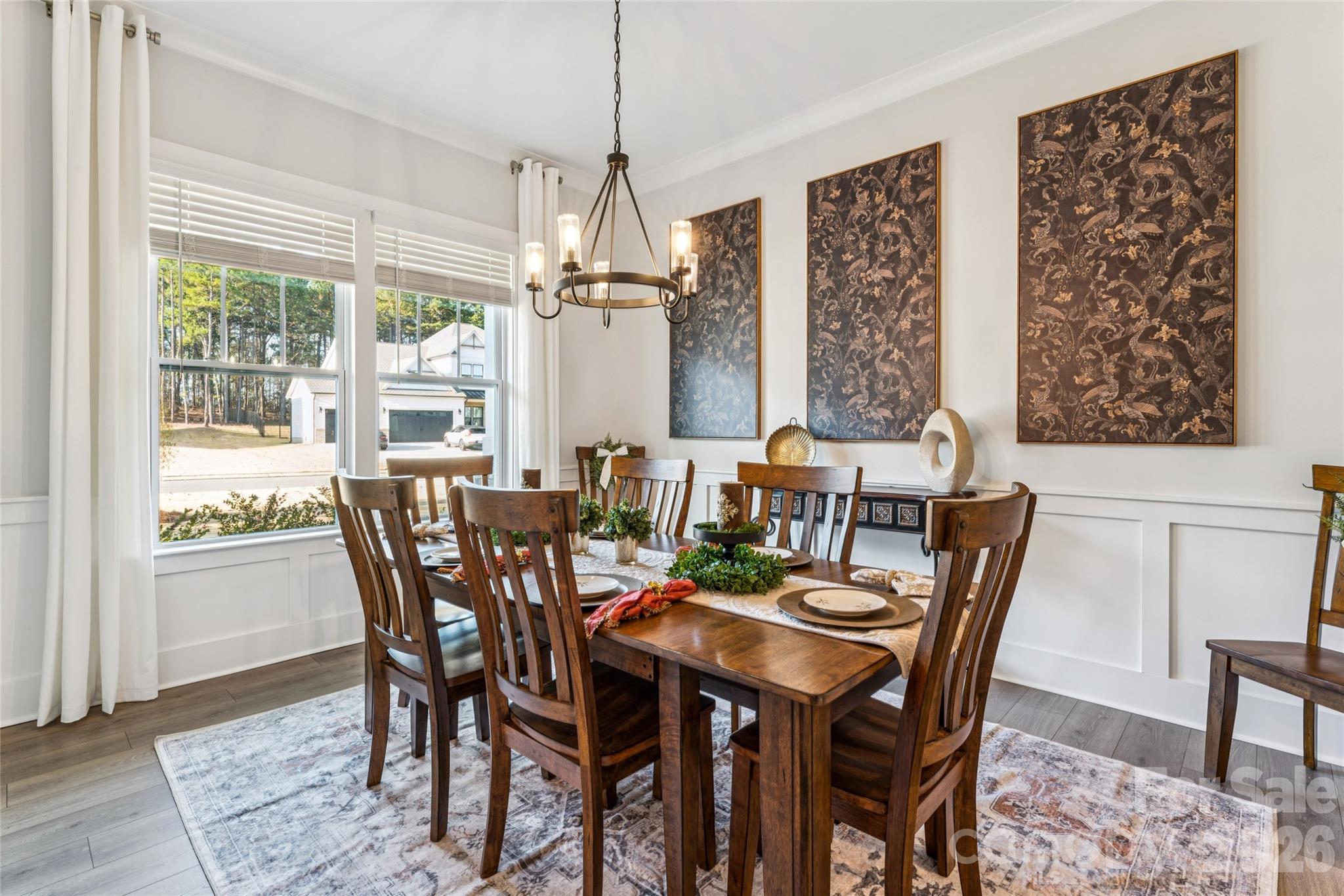 7822 Russell Road Indian Trail, NC 28079 - Photo 4 of 48 a view of a dining room with furniture window and wooden floor
