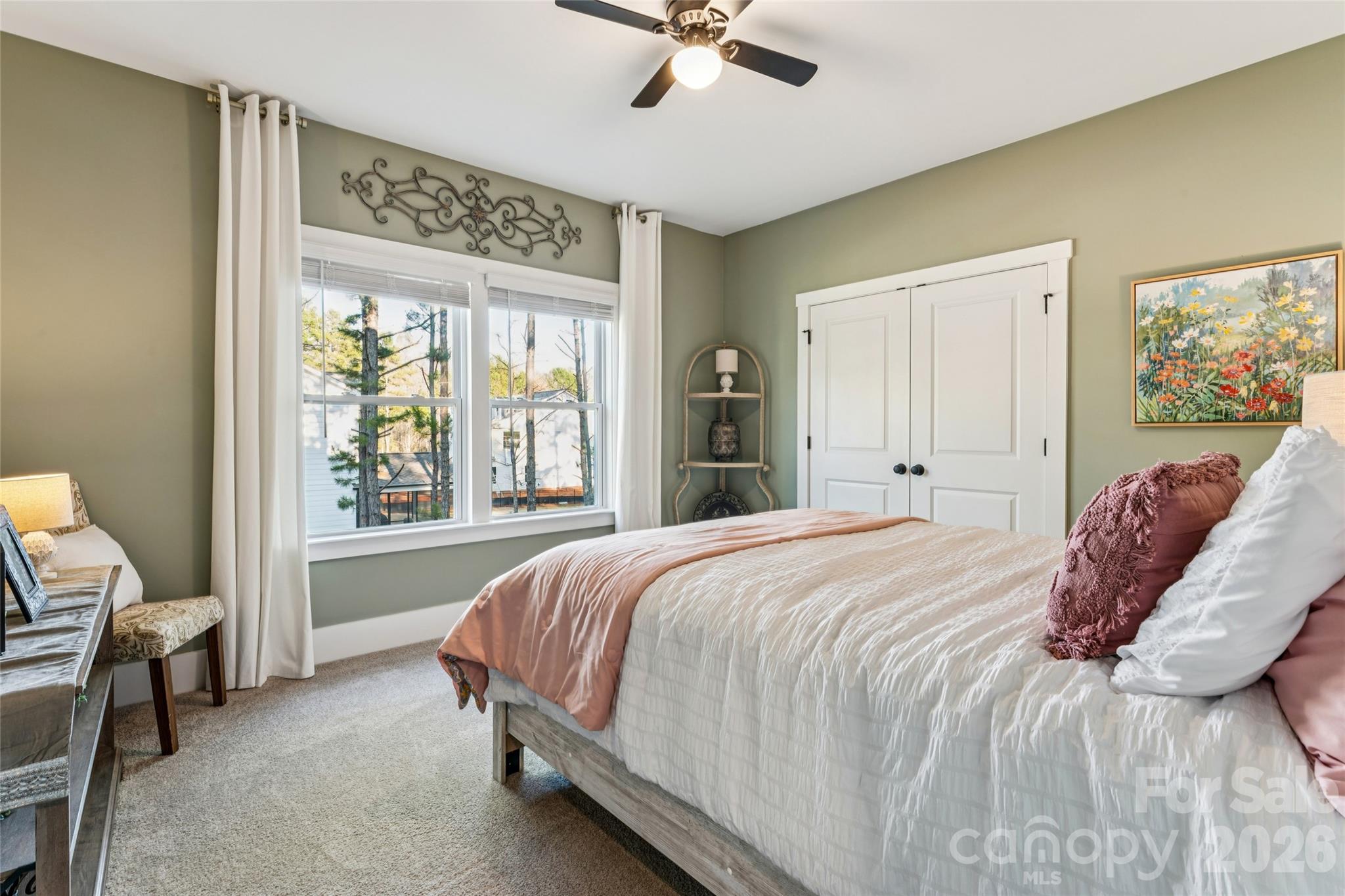 7822 Russell Road Indian Trail, NC 28079 - Photo 43 of 48 a bedroom with a bed and a window