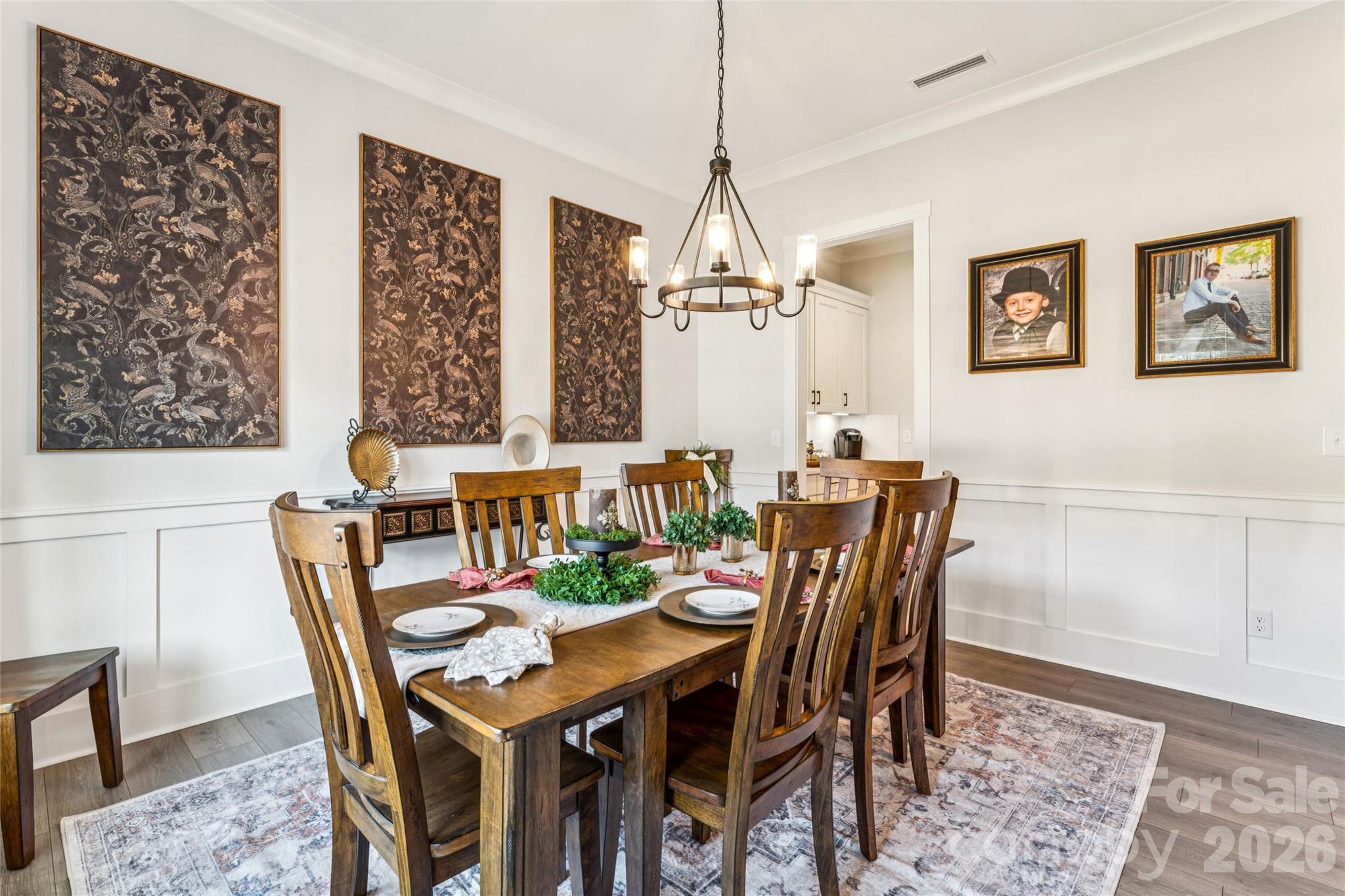 7822 Russell Road Indian Trail, NC 28079 - Photo 5 of 48 a view of a dining room with furniture window and wooden floor